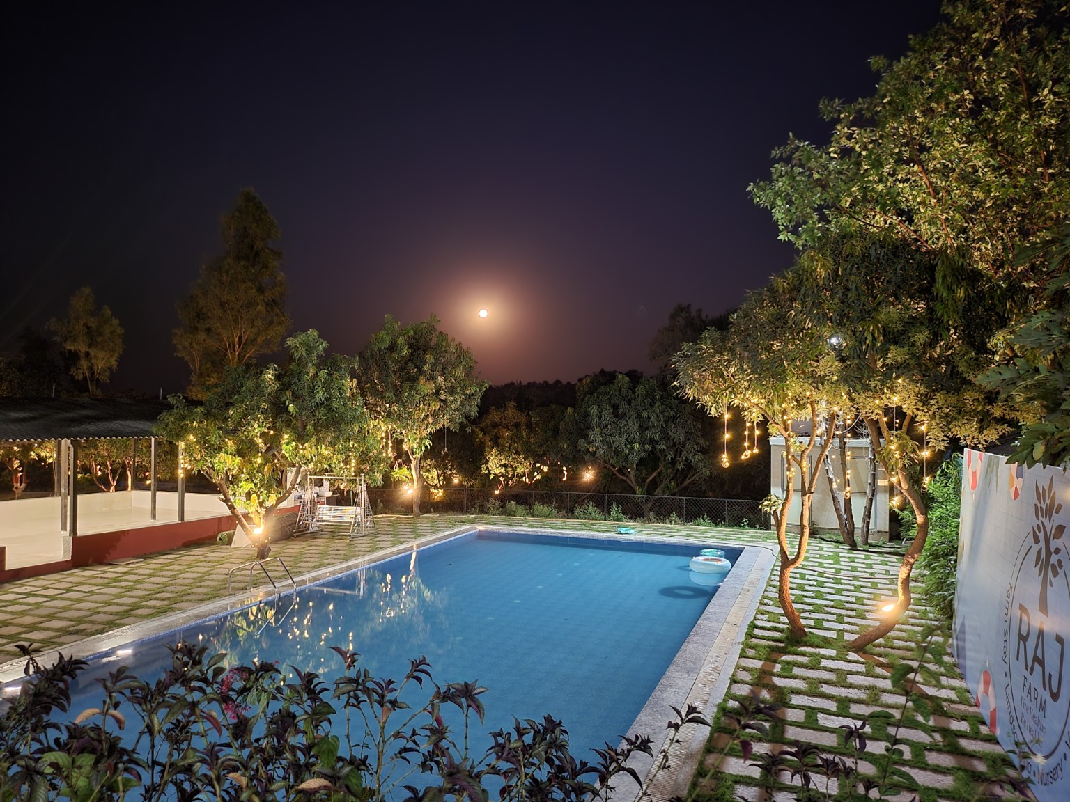 Raj Farm pool at night